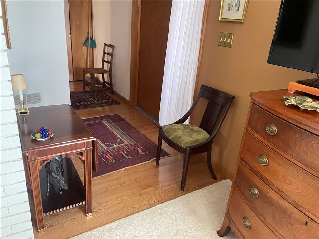 300 6th Street, Unit 10 Beaver, PA 15009 - Photo 8 of 18 a living room with furniture and a fireplace