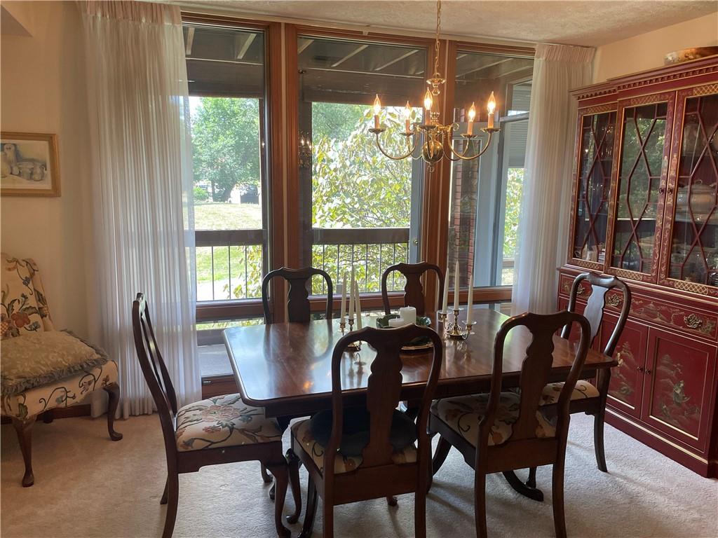 300 6th Street, Unit 10 Beaver, PA 15009 - Photo 10 of 18 a view of a dining room with furniture window and outside view