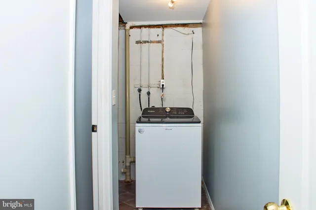 a room with a door and a window