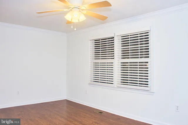 a view of a room that has a window in it