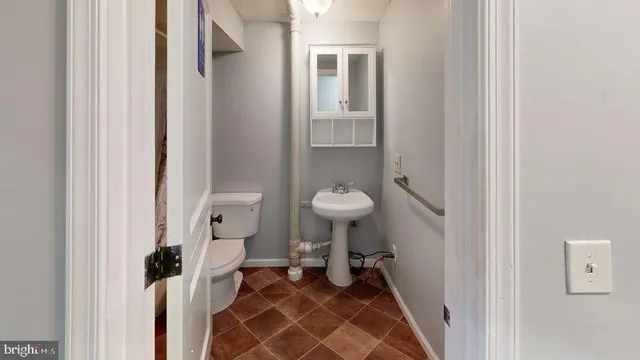a bathroom with a sink and a toilet