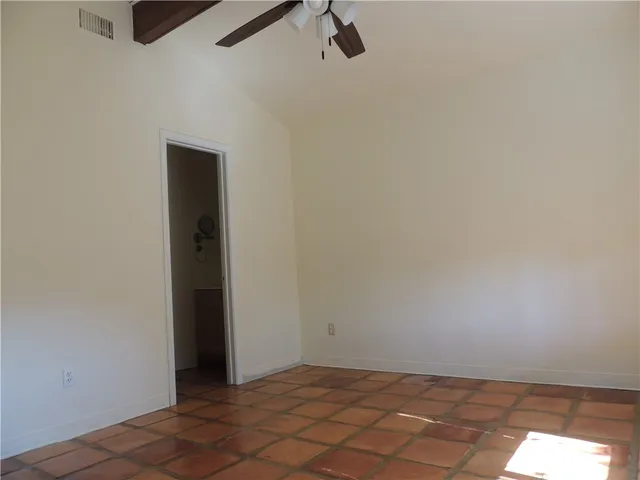 a view of a room that has a window