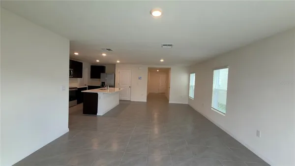 a view of a kitchen with a sink