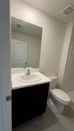 a bathroom with a sink and a toilet