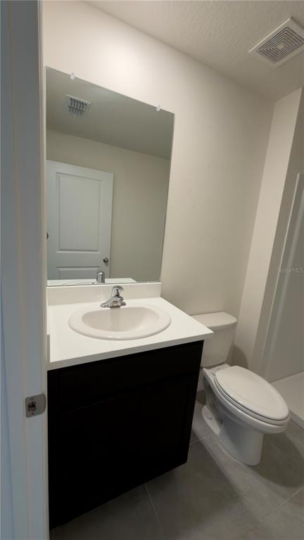 8632 Southwest 45th Court Ocala, FL 34476 - Photo 19 of 41 a bathroom with a sink and a toilet