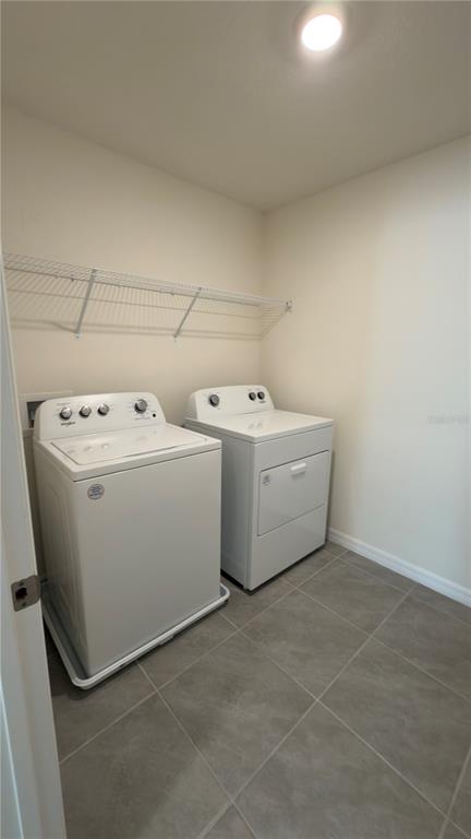 8632 Southwest 45th Court Ocala, FL 34476 - Photo 22 of 41 a utility room with dryer and washer
