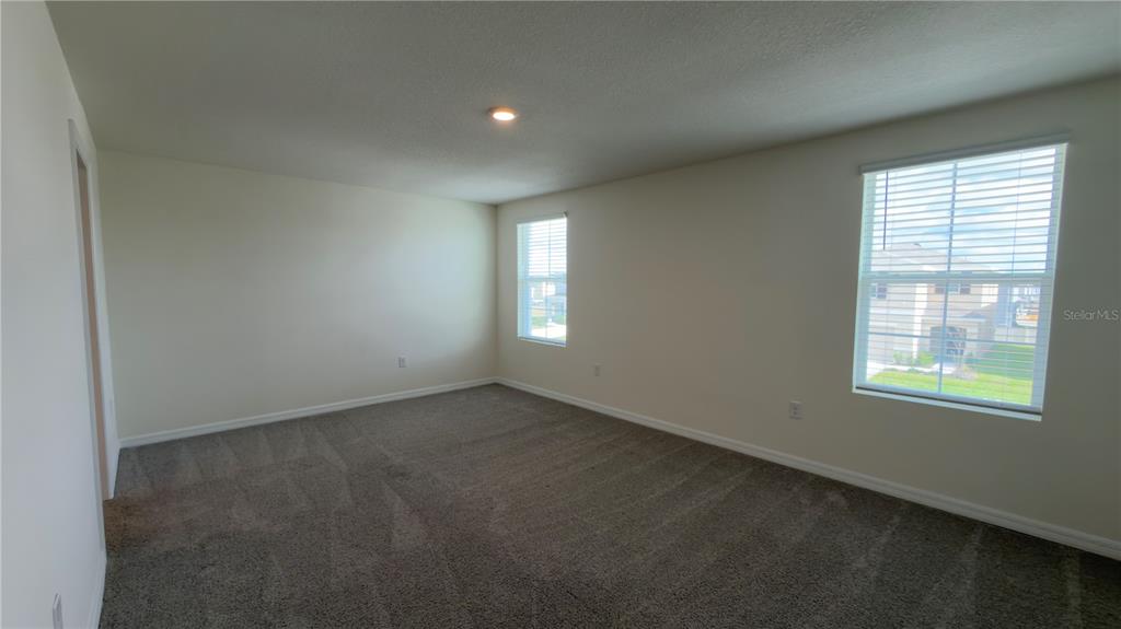 8632 Southwest 45th Court Ocala, FL 34476 - Photo 23 of 41 an empty room with a window