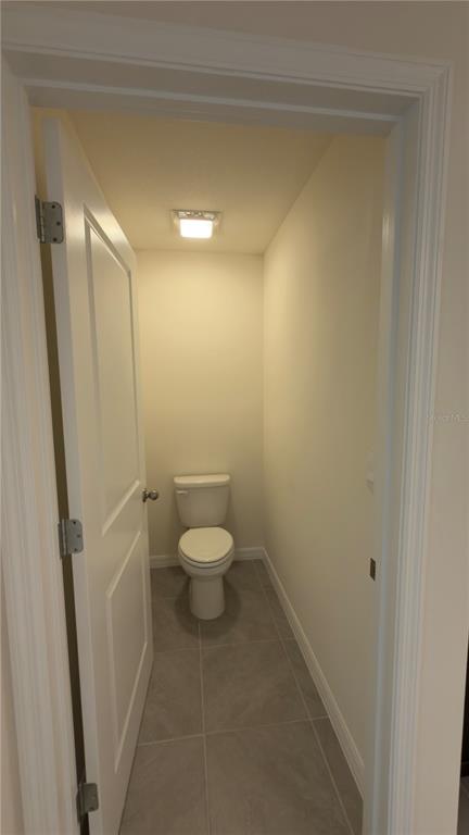 8632 Southwest 45th Court Ocala, FL 34476 - Photo 25 of 41 a bathroom with a toilet and a shower
