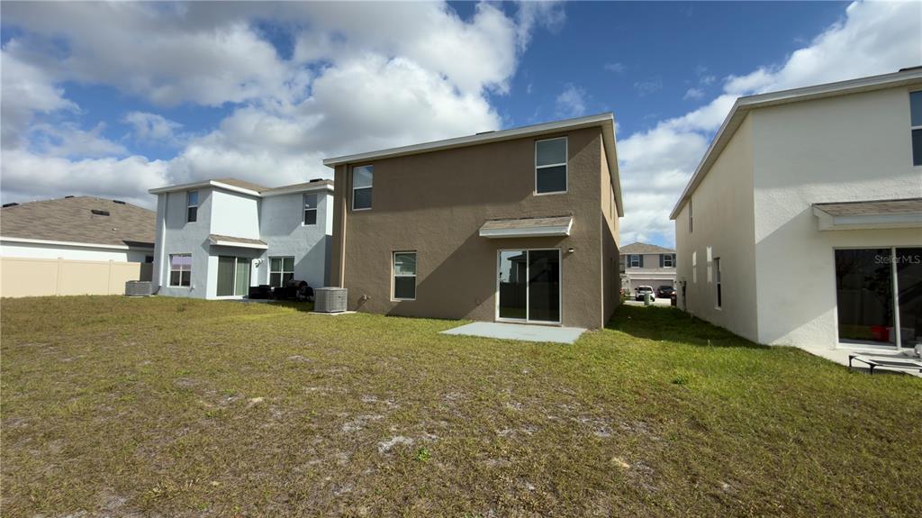 8632 Southwest 45th Court Ocala, FL 34476 - Photo 41 of 41 a view of a house with a yard and garage