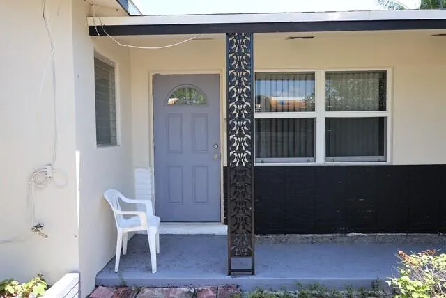 a front view of a house with entryway