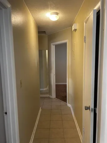 a view of hallway with shower