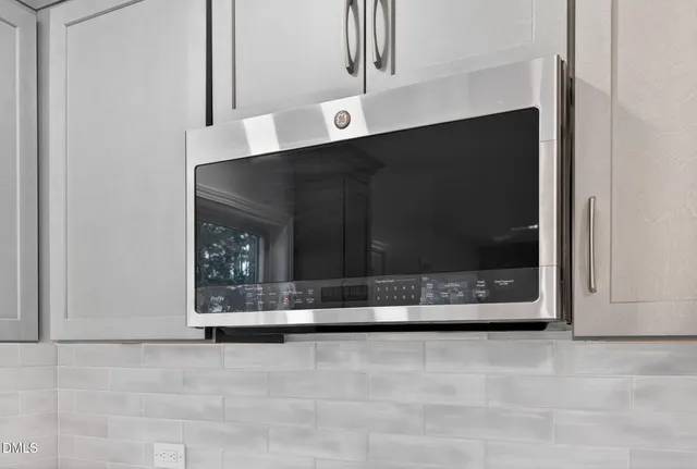 a living room with a fireplace