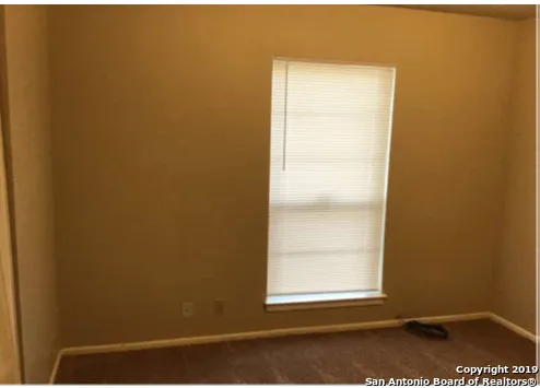 a view of a small space with window