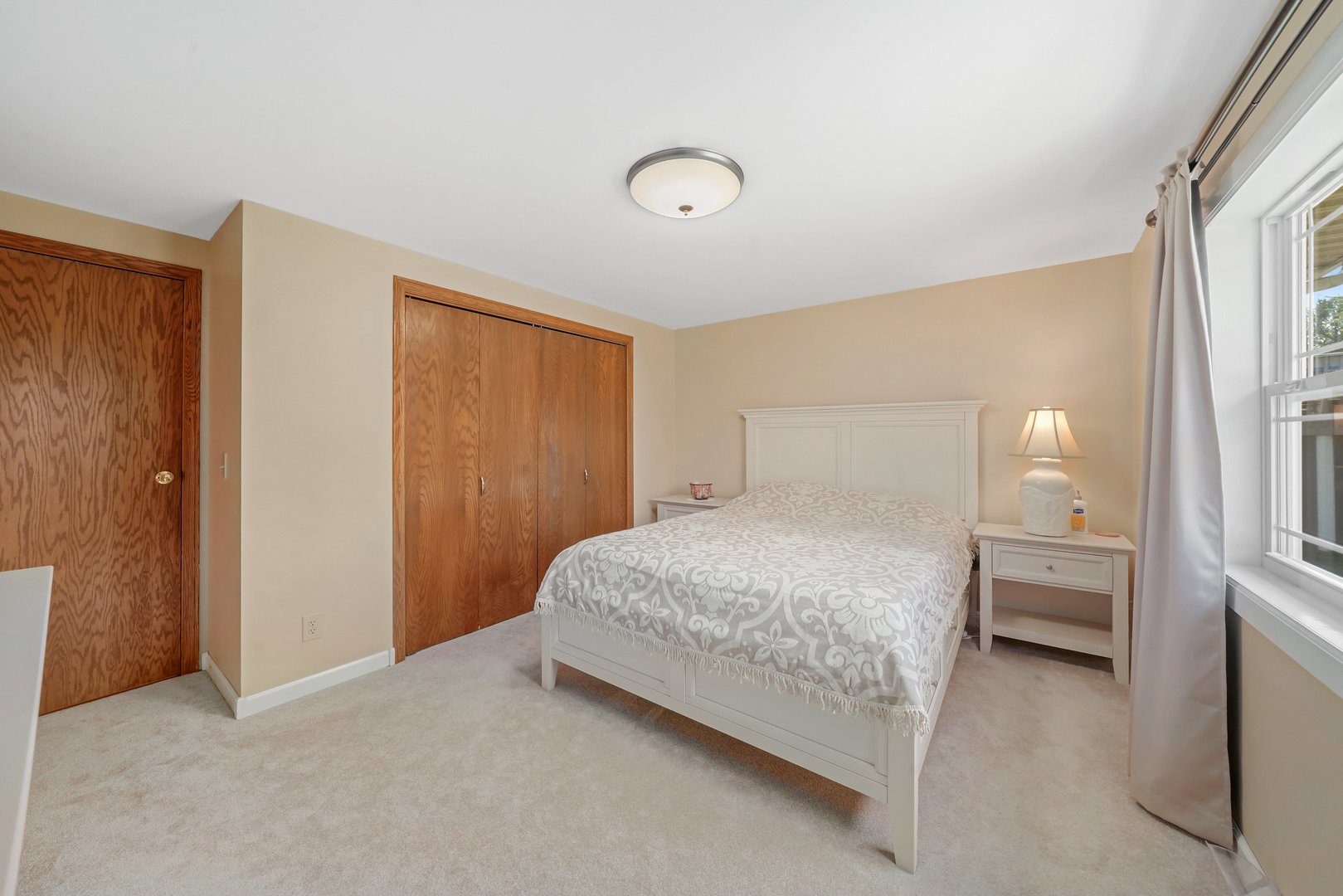 417 Pembroke Road Southwest Poplar Grove, IL 61065 - Photo 14 of 45 a bedroom with a bed and a window