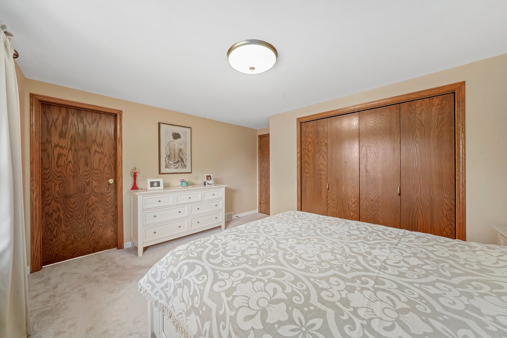 417 Pembroke Road Southwest Poplar Grove, IL 61065 - Photo 15 of 45 a bedroom with a bed and a dresser