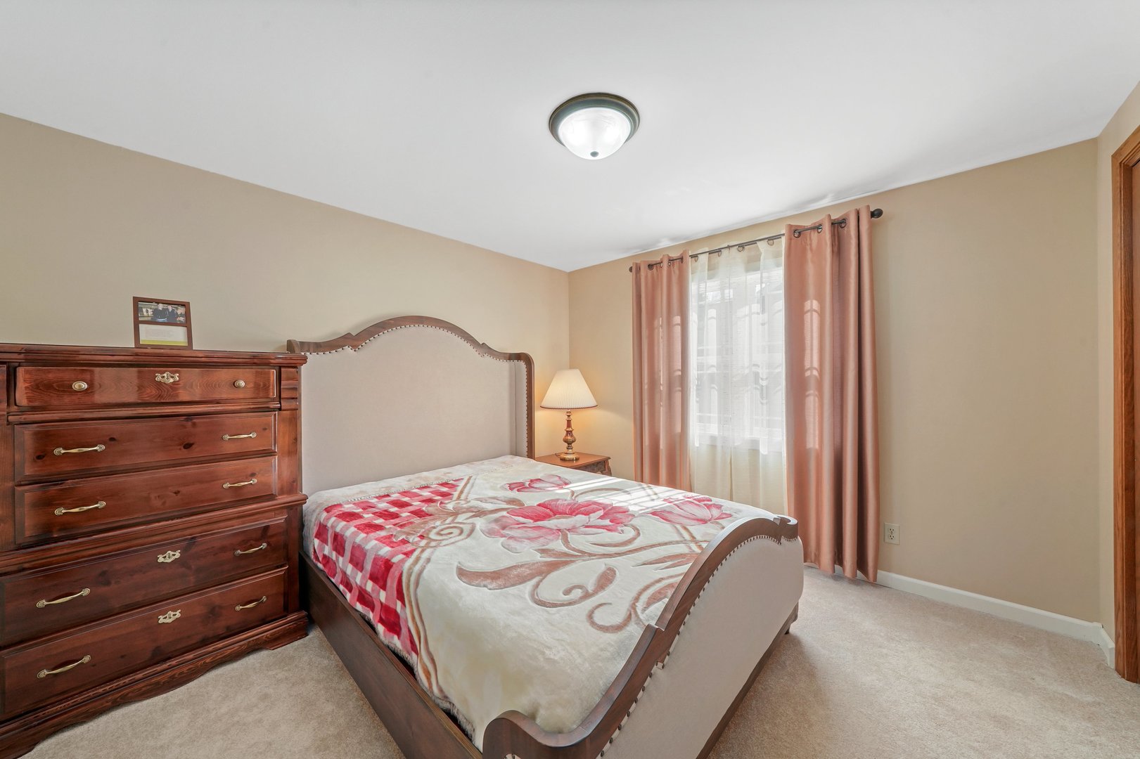 417 Pembroke Road Southwest Poplar Grove, IL 61065 - Photo 16 of 45 a bedroom with a bed and a mirror