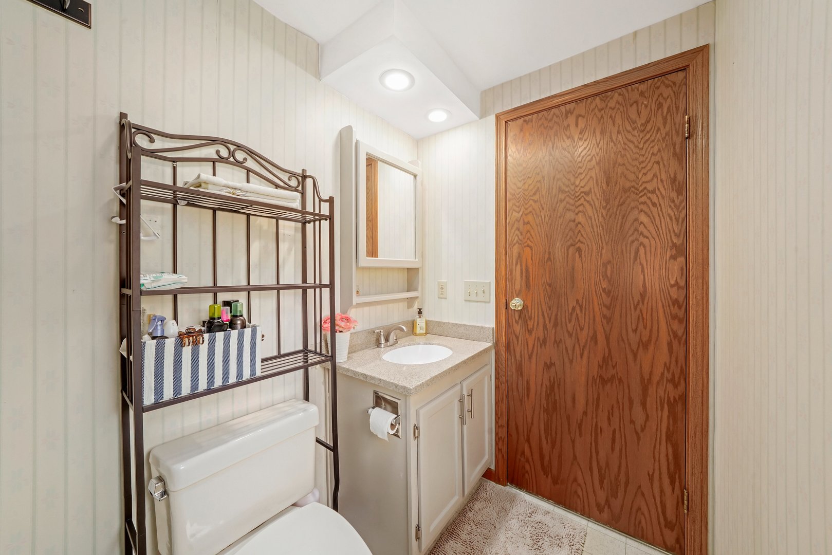 417 Pembroke Road Southwest Poplar Grove, IL 61065 - Photo 24 of 45 a bathroom with a sink a toilet and shower
