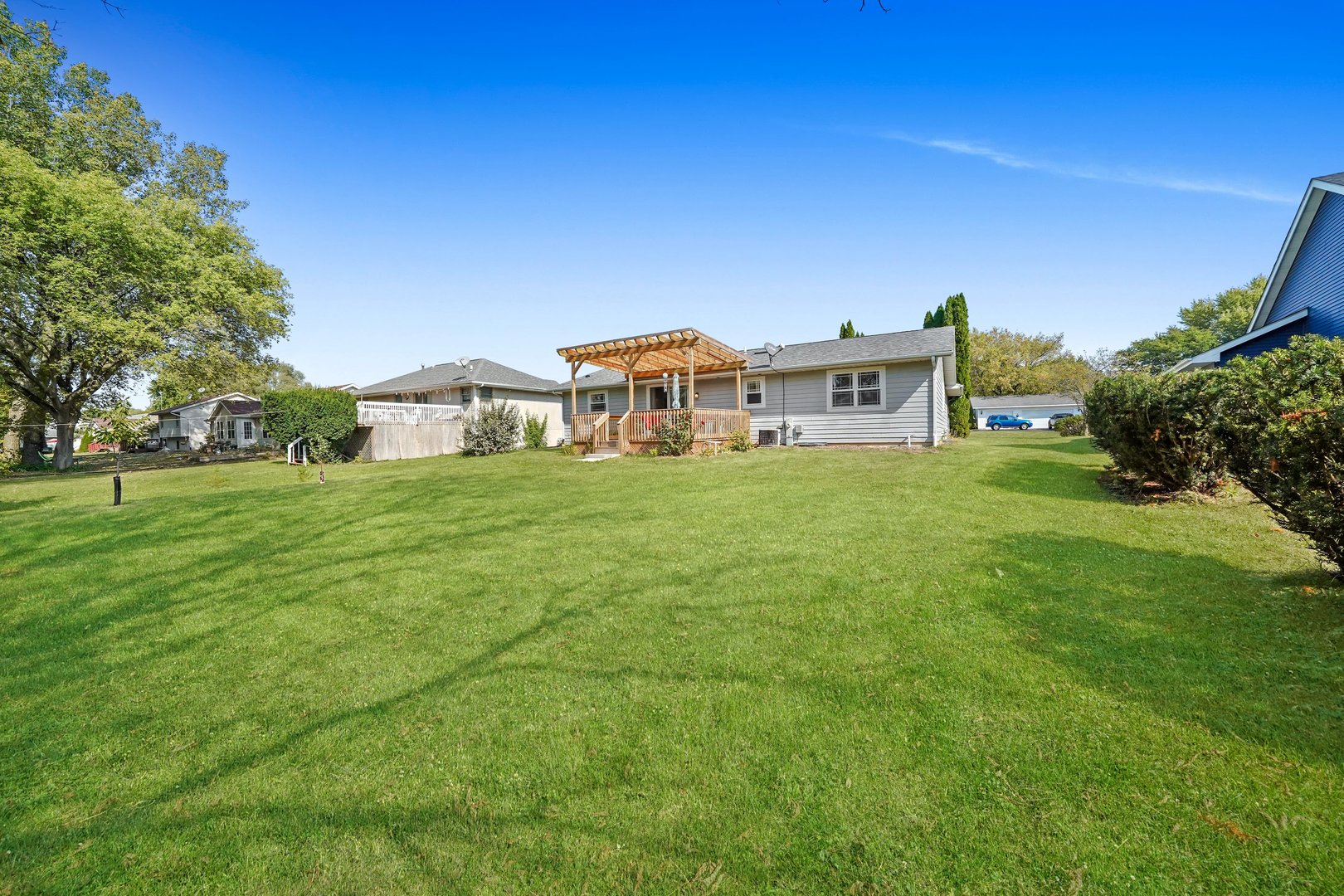 417 Pembroke Road Southwest Poplar Grove, IL 61065 - Photo 31 of 45 a view of a house with a big yard