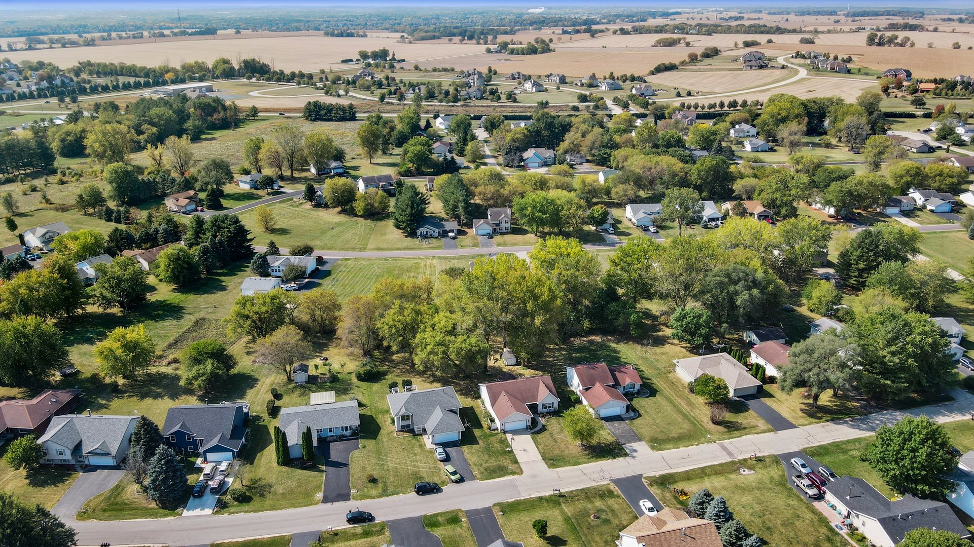 417 Pembroke Road Southwest Poplar Grove, IL 61065 - Photo 42 of 45 an aerial view of residential houses with outdoor space
