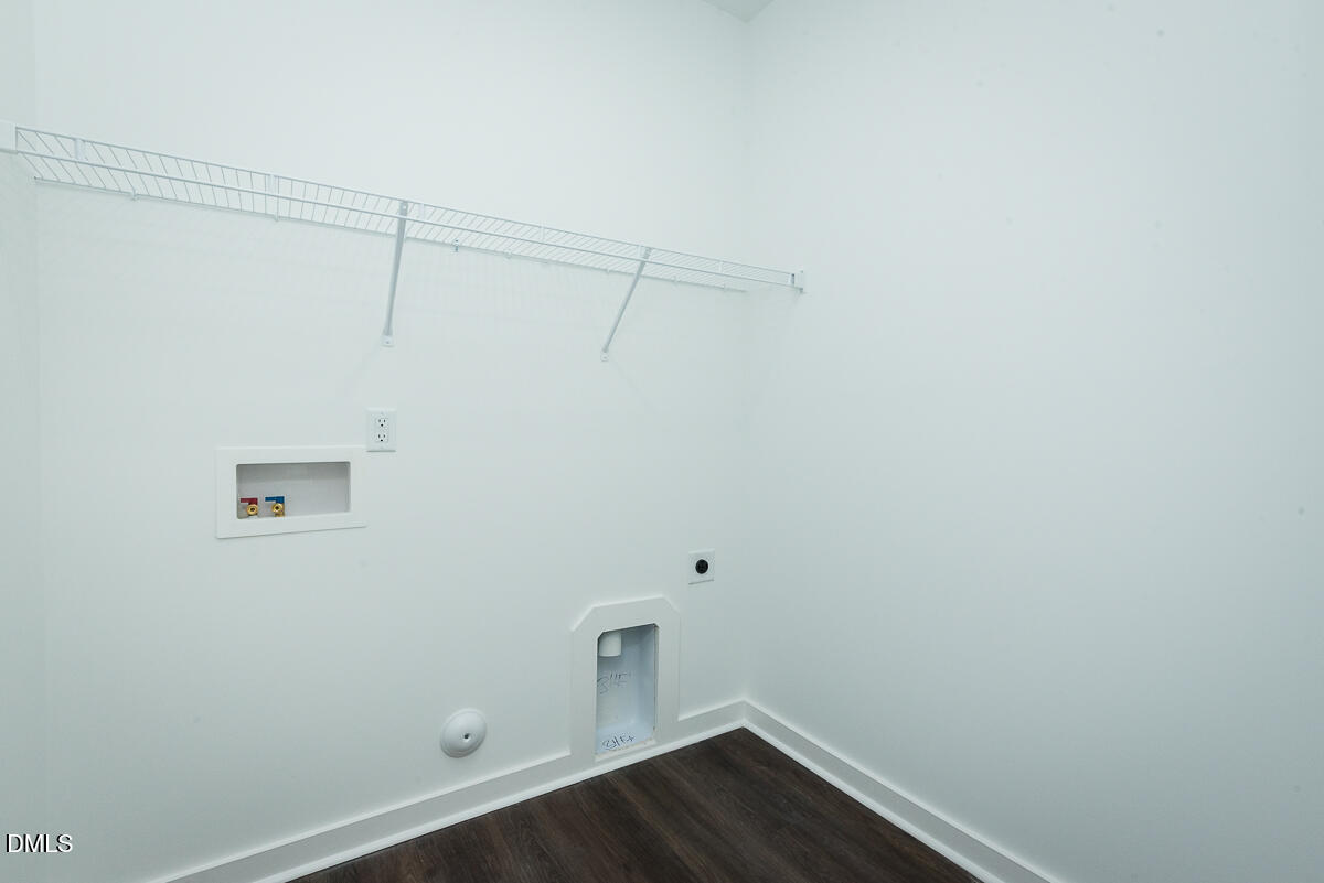 2828 Ricolden Trail Elon, NC 27244 - Photo 8 of 14 a view of a room with racks on the wall