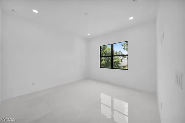 a bathroom with 2 sink and a mirror