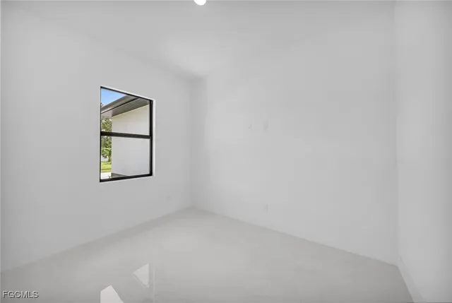 a view of entryway and hall with a window