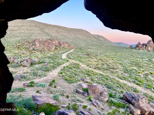 a view of a ocean with a mountain