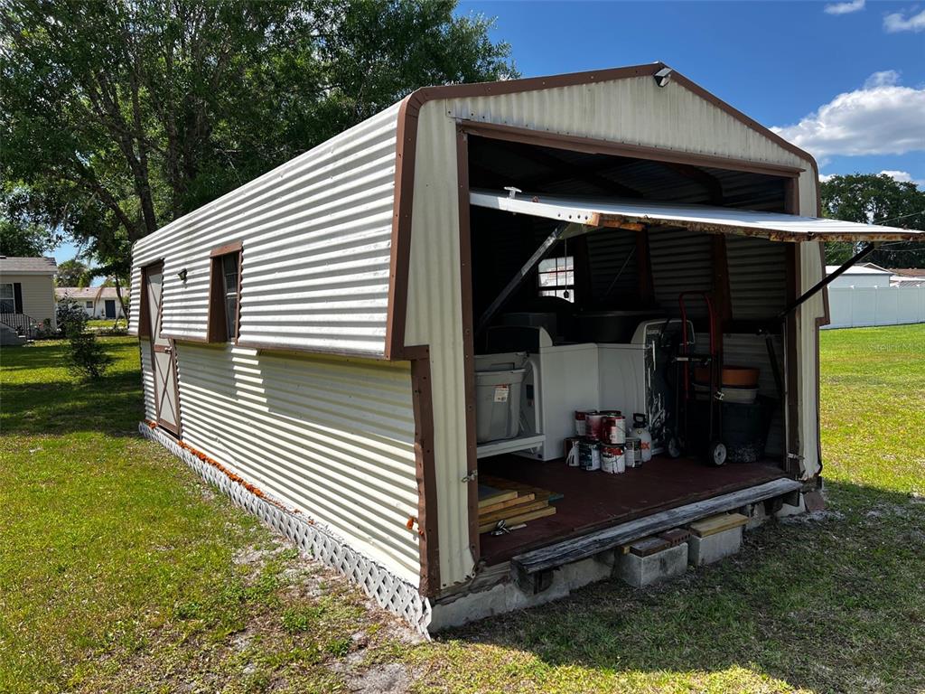 1670 Liberty Bell Street Kissimmee, FL 34758 - Photo 17 of 25 a view of sitting area in front of house