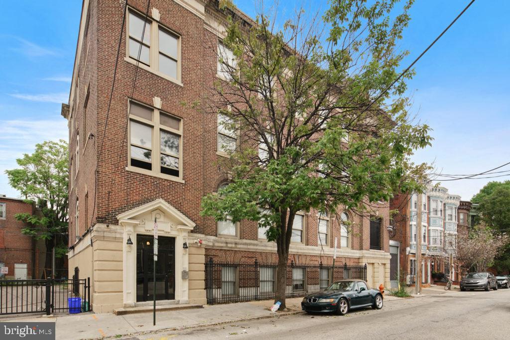 427-33 Monroe Street, Unit 102 Philadelphia, PA 19147 - Photo 22 of 23 a view of a car park in front of a building