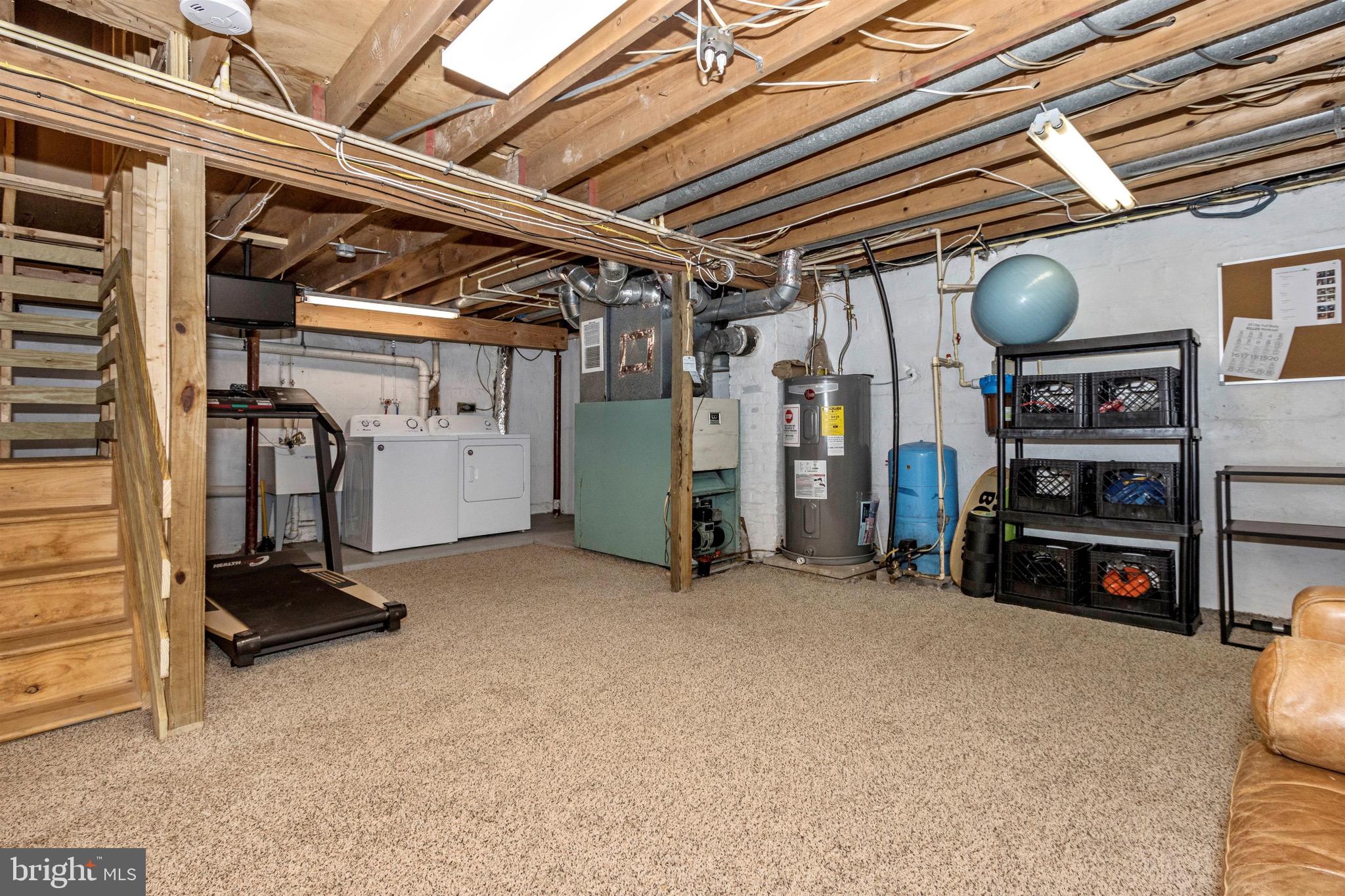 15123 Comus Road Clarksburg, MD 20871 - Photo 21 of 27 Lower Level Laundry Area and Home Gym