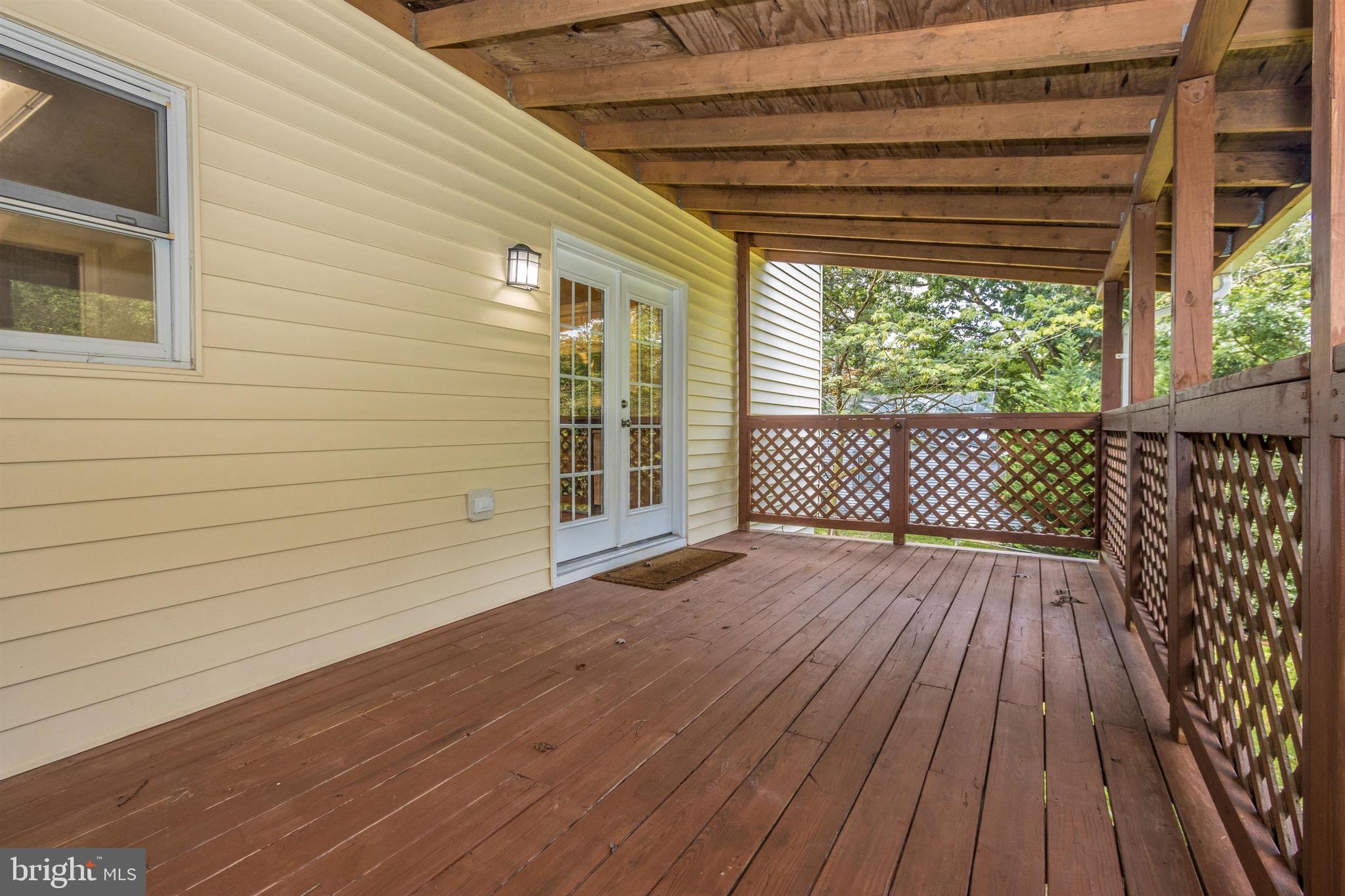 15123 Comus Road Clarksburg, MD 20871 - Photo 24 of 27 Deck Overlooks Big Fenced Yard