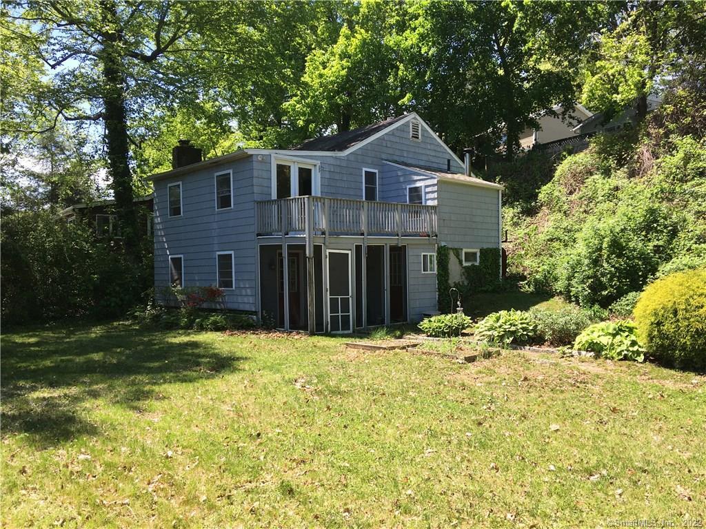 35 Underhill Road Newtown, CT 06482 - Photo 1 of 1 a front view of a house with a yard