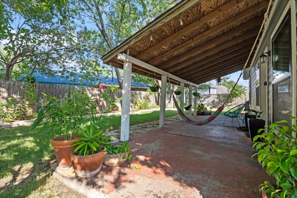 2506 Jenibeth Lane Austin, TX 78744 - Photo 21 of 23 Over-sized covered patio