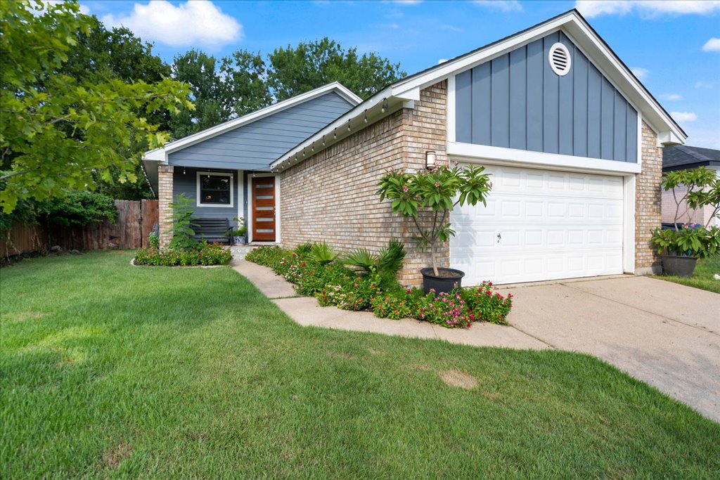 2506 Jenibeth Lane Austin, TX 78744 - Photo 3 of 23 House sits on a small hill, and has excellent curb appeal