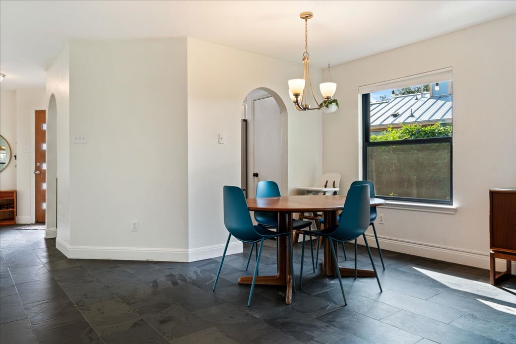 2506 Jenibeth Lane Austin, TX 78744 - Photo 10 of 23 Dining space: Kitchen is through the arched doorway