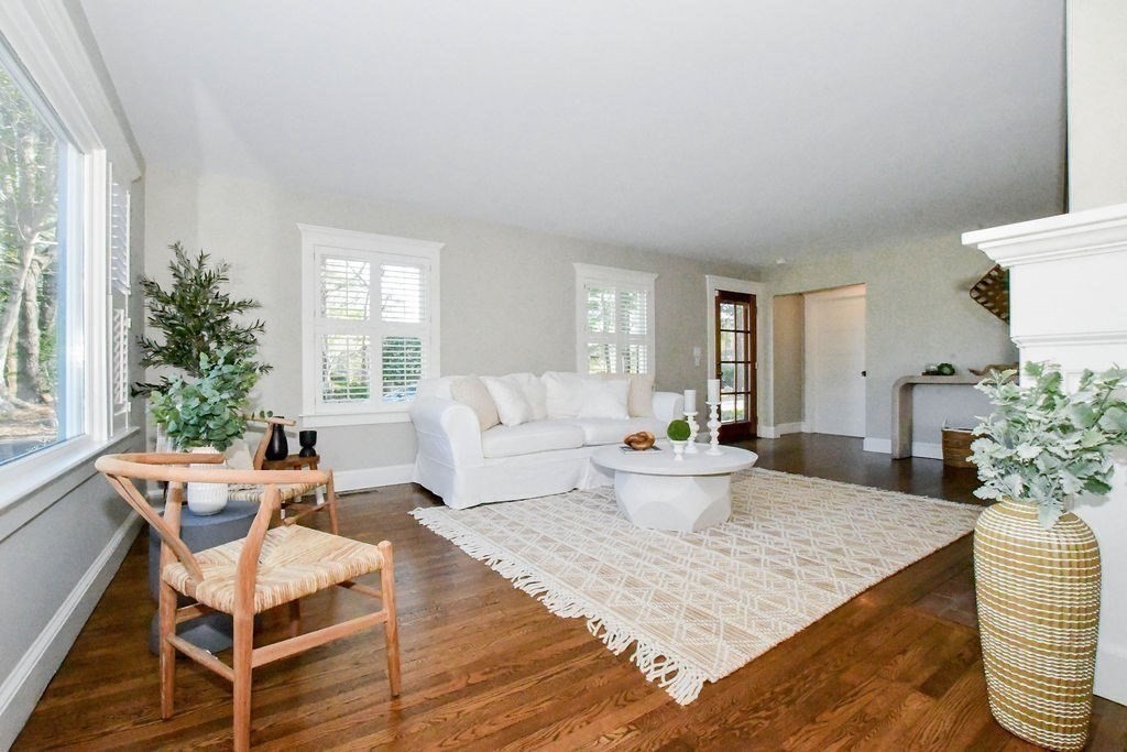 37 Holmes Street Marion, MA 02738 - Photo 12 of 37 a living room with furniture and a potted plant