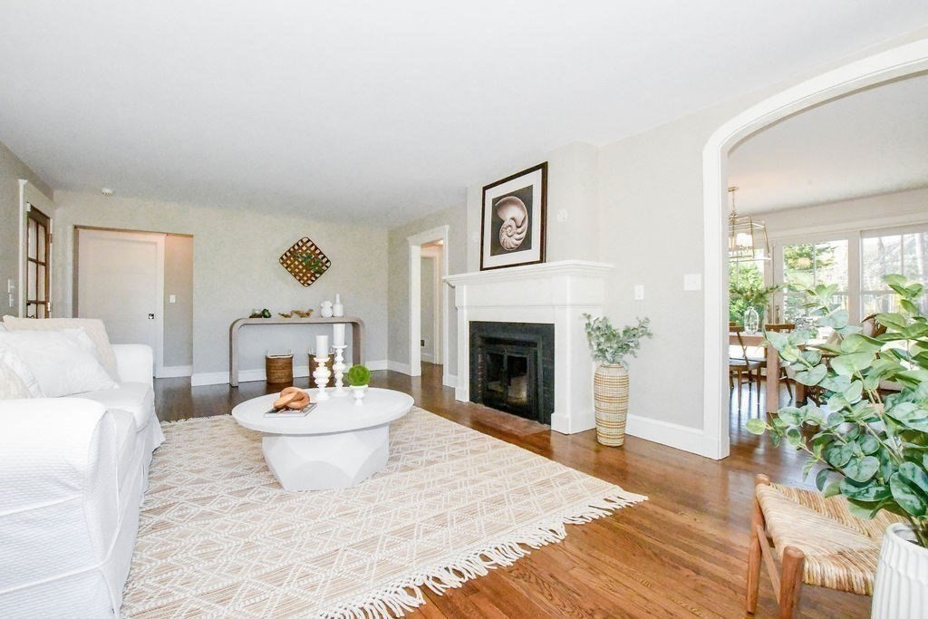 37 Holmes Street Marion, MA 02738 - Photo 13 of 37 a living room with a couch and a potted plant