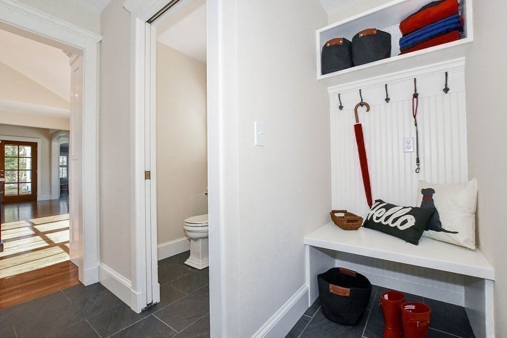 37 Holmes Street Marion, MA 02738 - Photo 21 of 37 a view of walk in closet with clothes and shoes