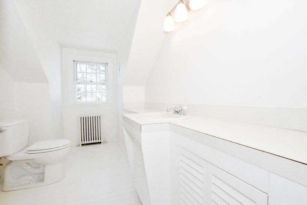 37 Holmes Street Marion, MA 02738 - Photo 24 of 37 a bathroom with a sink toilet and shower