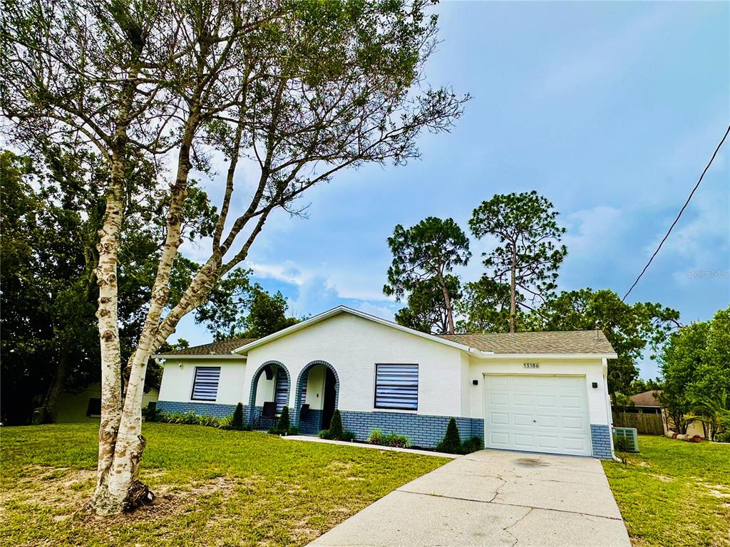 13186 Thrush Street Spring Hill, FL 34609 - Photo 4 of 53