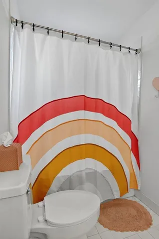 a bathroom with a sink and toilet