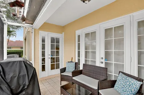 $395,000 | 11461 Lakeview Drive, Unit 8, Coral Springs, FL 33071