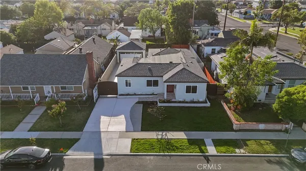 an aerial view of a house with a garden