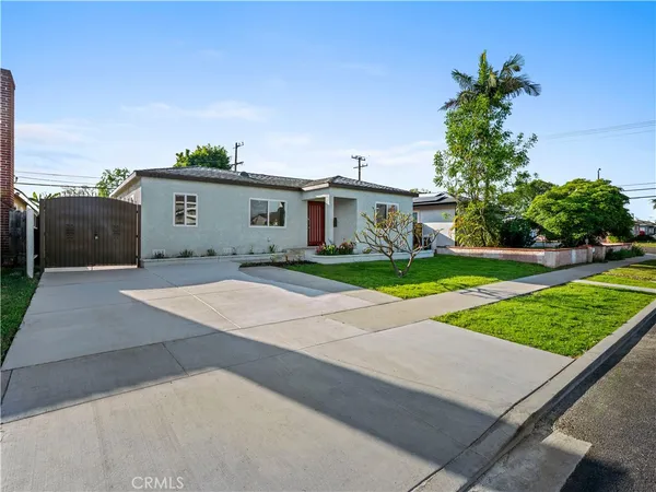 a house with yard in front of it