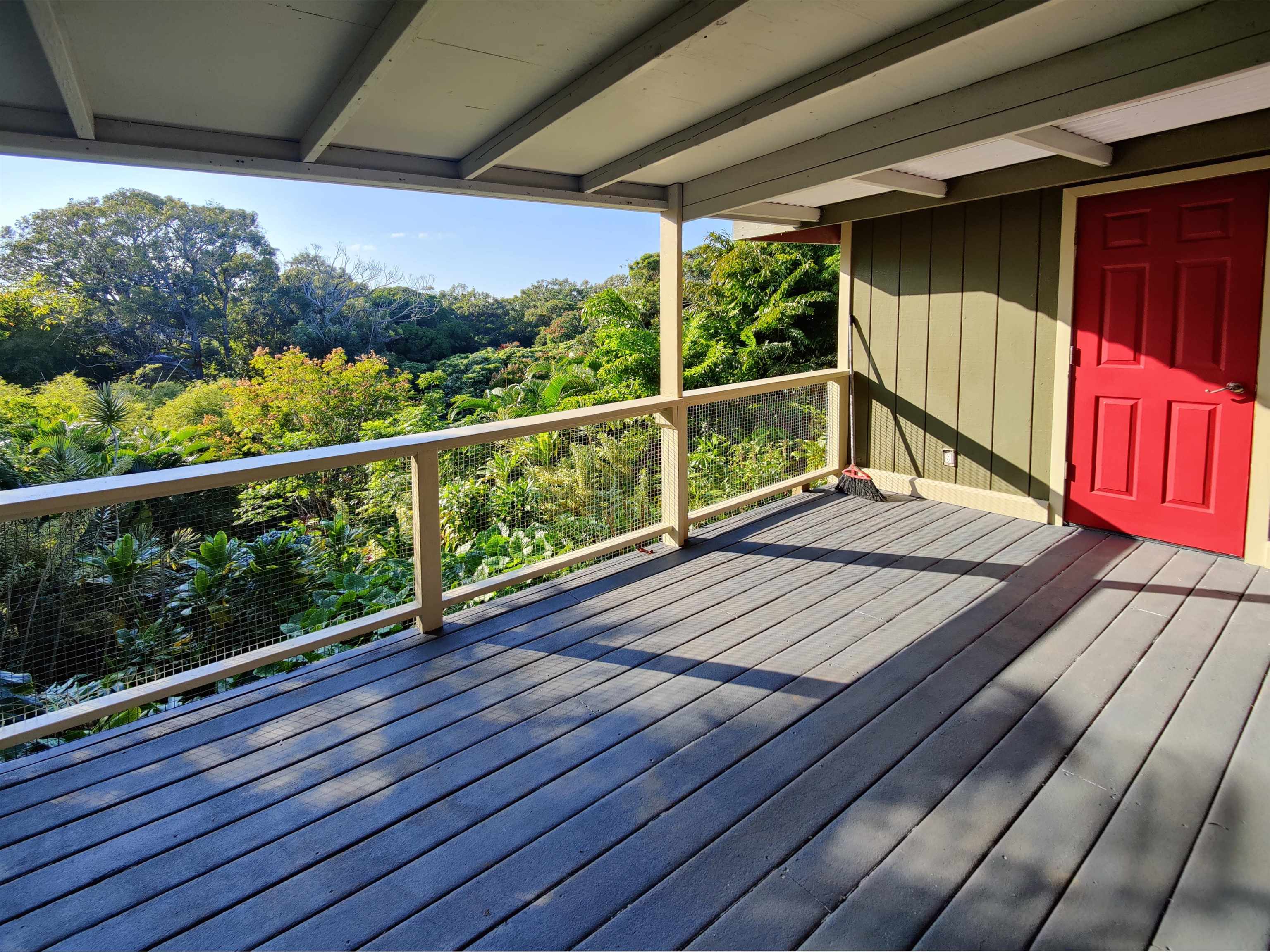 142 Peahi Road Haiku, HI 96708 - Photo 19 of 21 a view of balcony with wooden floor