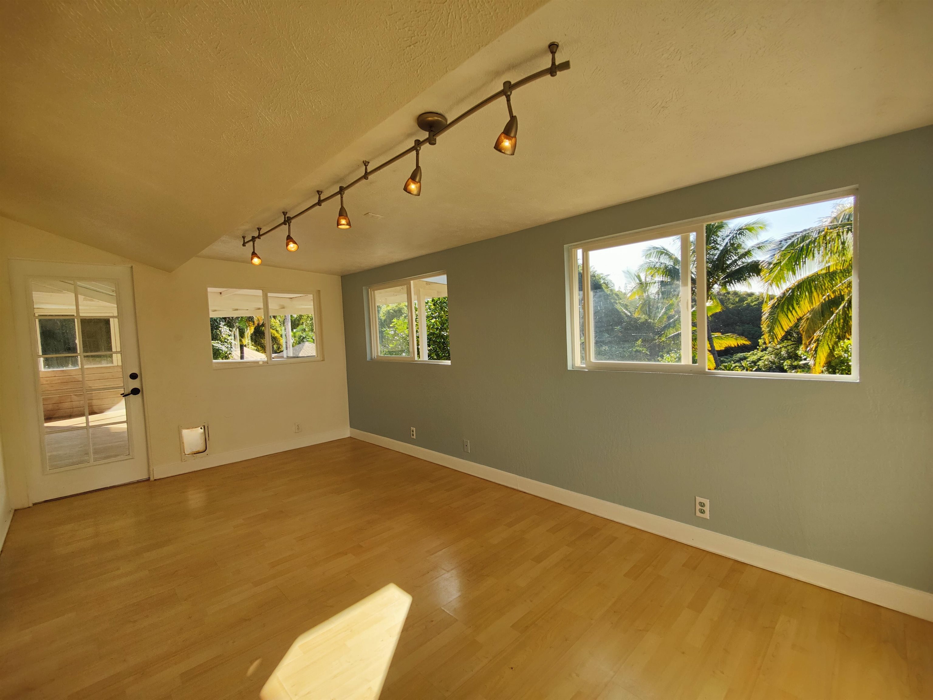 142 Peahi Road Haiku, HI 96708 - Photo 4 of 21 a view of an empty room with a window