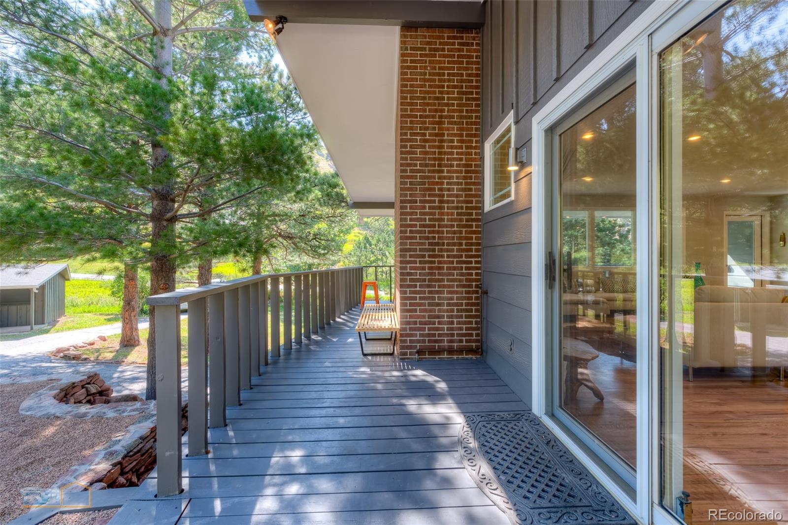 6724 Olde Stage Road Boulder, CO 80302 - Photo 23 of 30 a view of a porch with wooden floor