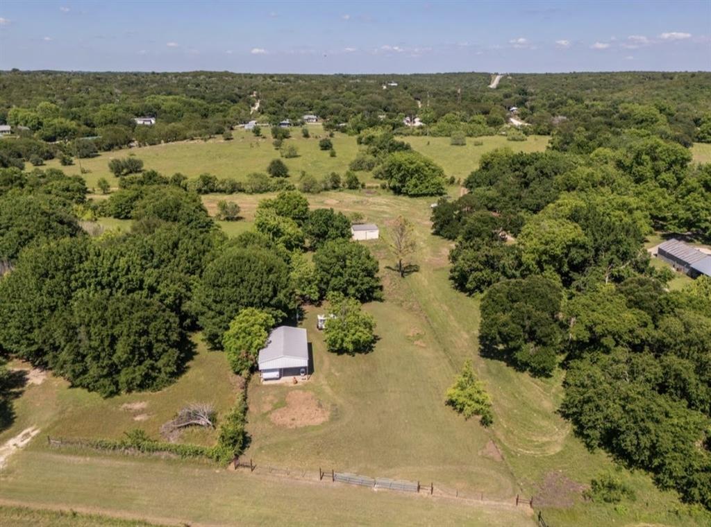 163 Fenn Road Blum, TX 76627 - Photo 5 of 8 an aerial view of residential house with ocean view