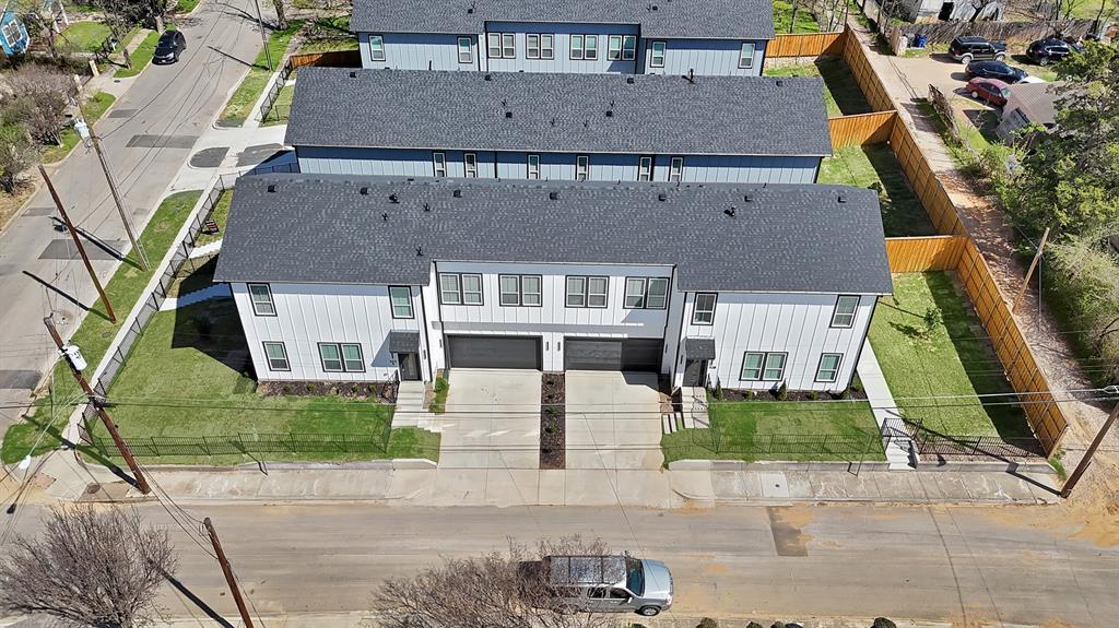 302 East 7th Street Dallas, TX 75203 - Photo 3 of 30 an aerial view of a house with a yard