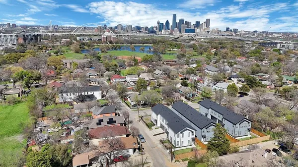 an aerial view of residential house with outdoor space